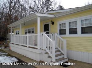504 Roberts Road Toms River, NJ 08755 - Photo 1 of 34 a view of a house with a small yard
