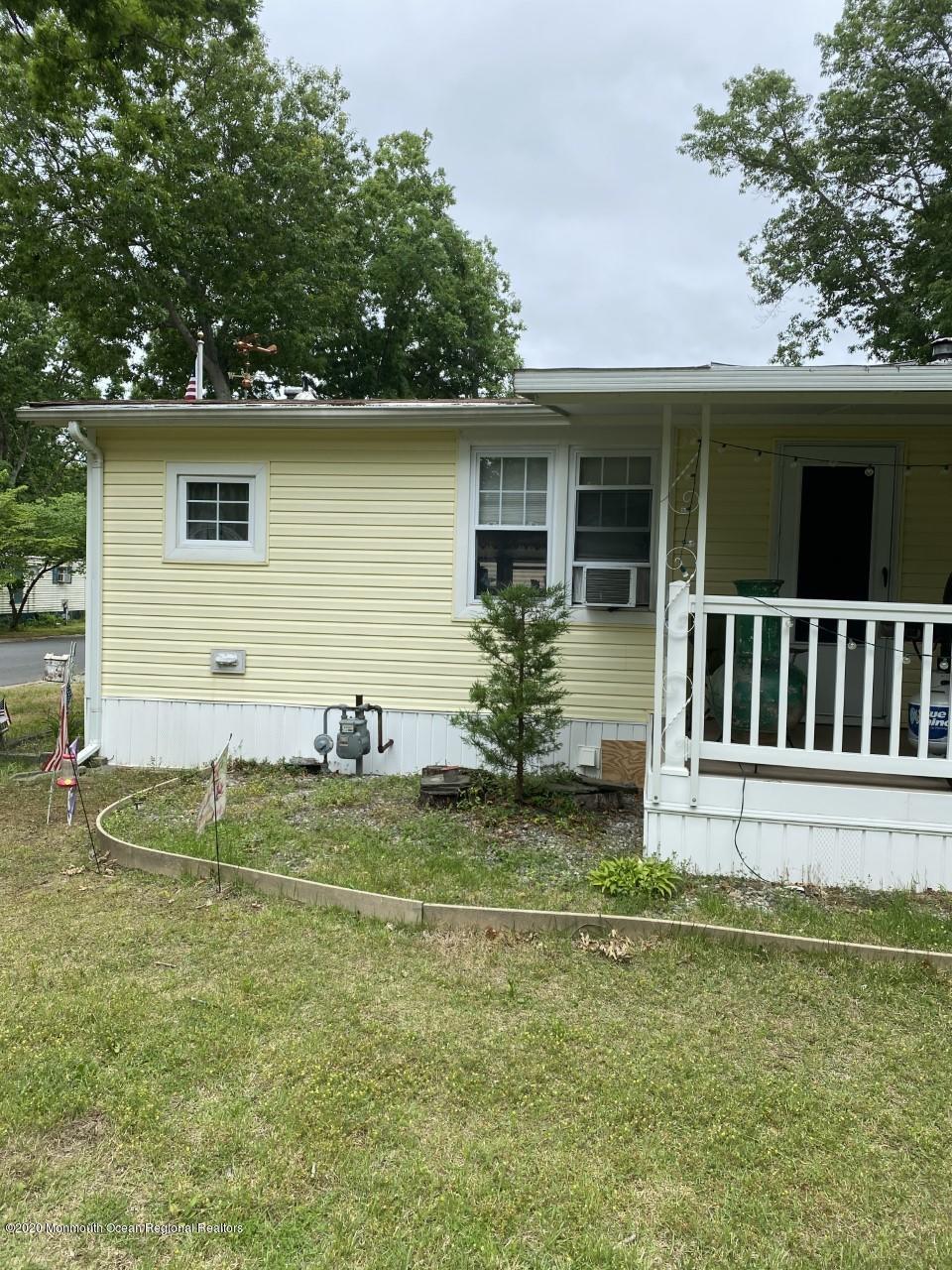 504 Roberts Road Toms River, NJ 08755 - Photo 27 of 34 a house that has garden in front of it