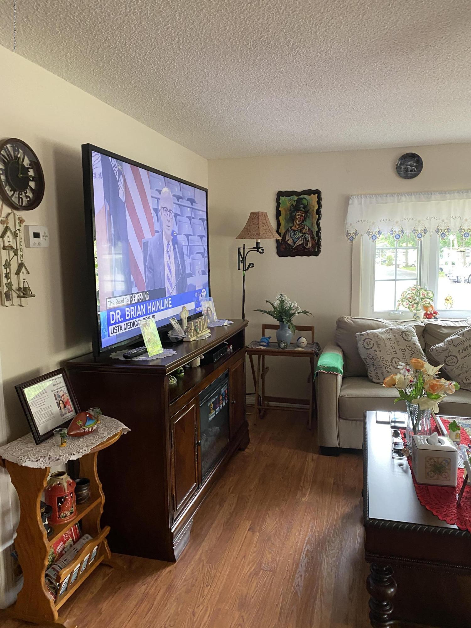 504 Roberts Road Toms River, NJ 08755 - Photo 6 of 34 a living room with furniture and a window