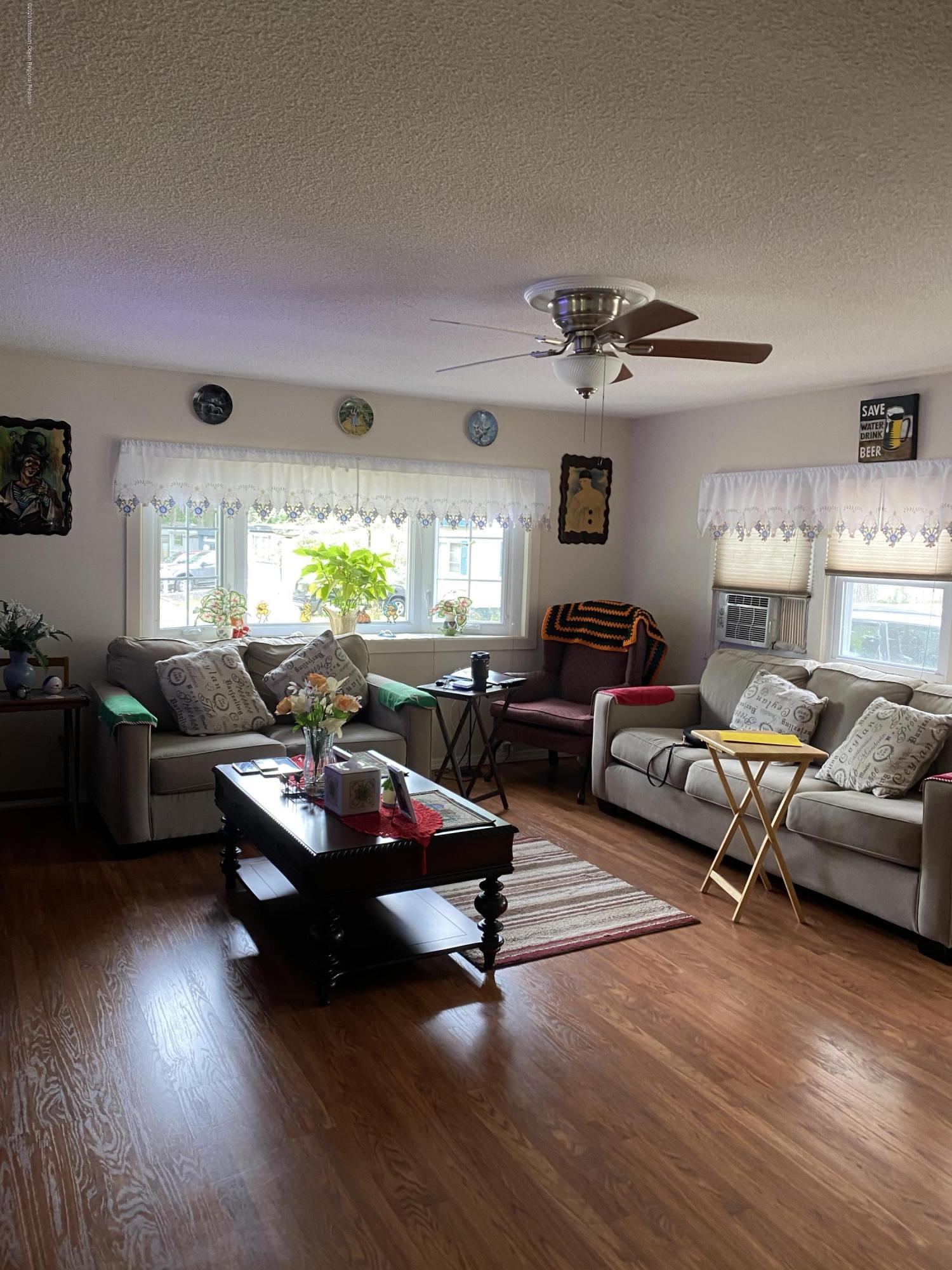 504 Roberts Road Toms River, NJ 08755 - Photo 7 of 34 a living room with furniture and wooden floor