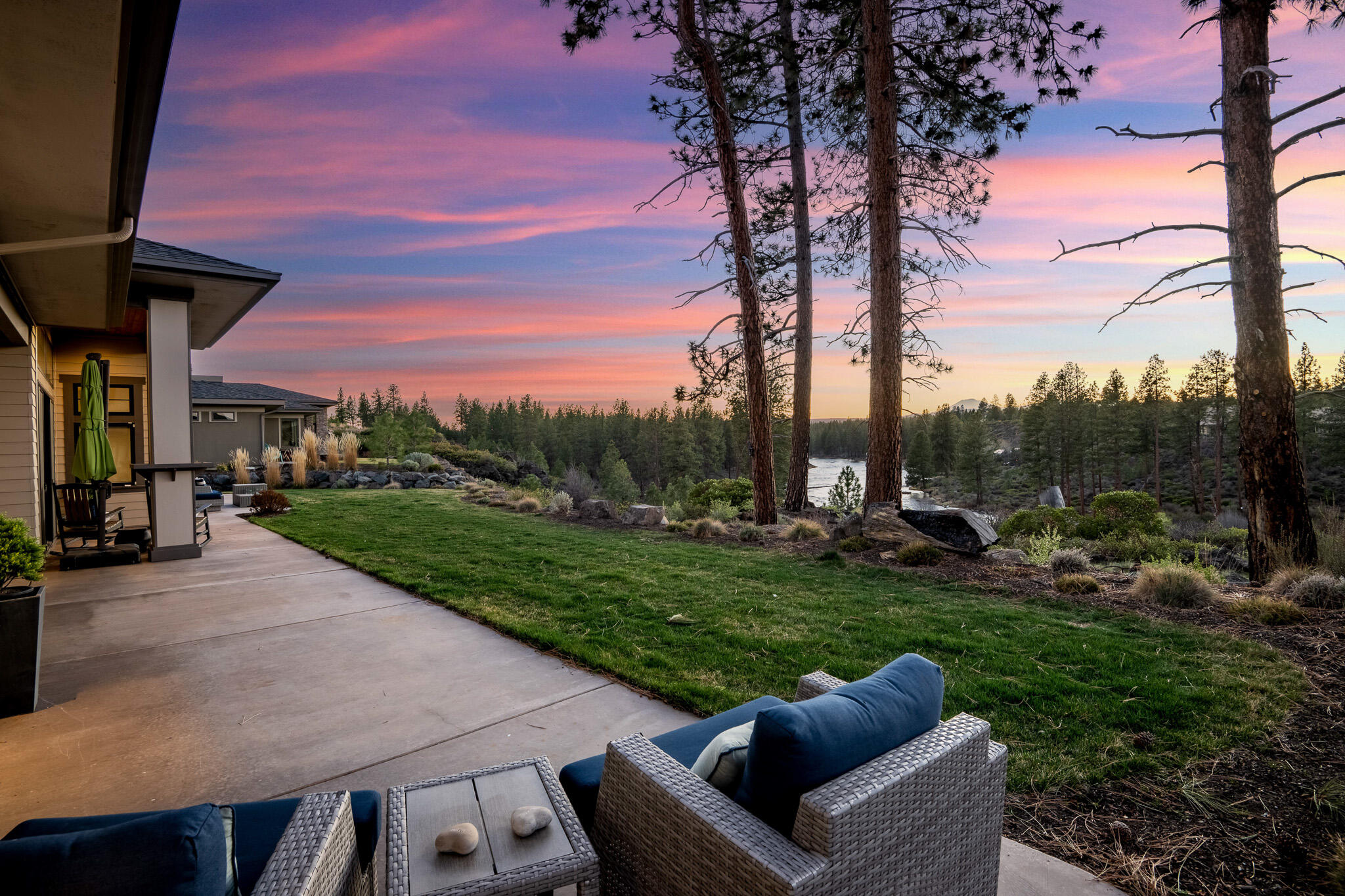60871 River Rim Drive Bend, OR 97702 - Photo 20 of 42 a view of a garden with patio