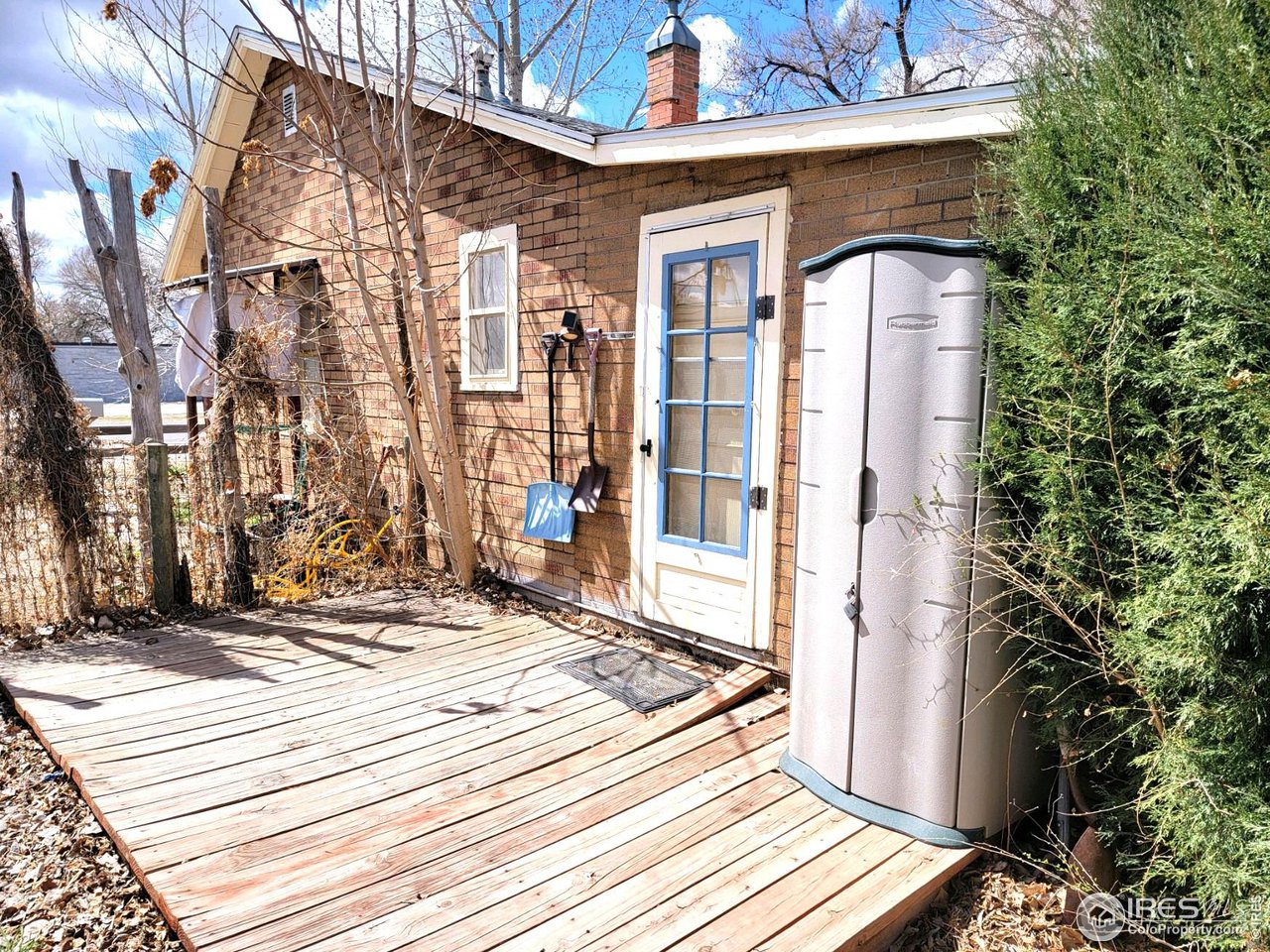528 Phelps Street Sterling, CO 80751 - Photo 3 of 12 a view of a brick building with many windows