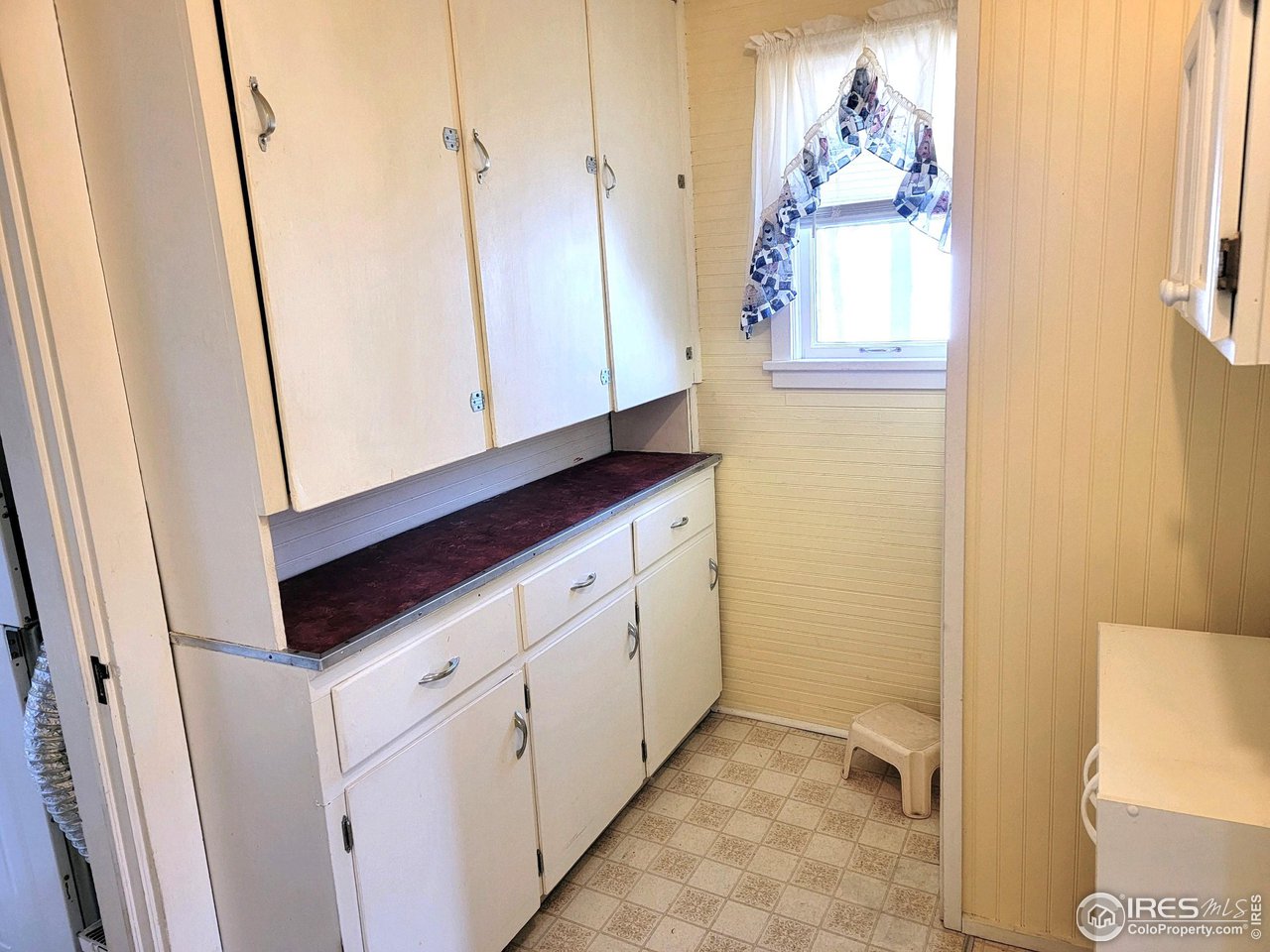 528 Phelps Street Sterling, CO 80751 - Photo 6 of 12 a bathroom with a sink a mirror and a toilet