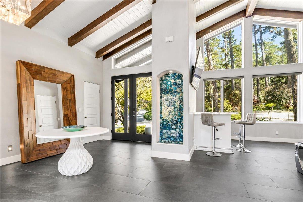 1276 Viscaino Road Pebble Beach, CA 93953 - Photo 19 of 64 a view of an entryway with wooden floor and door
