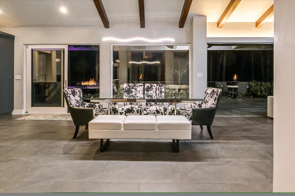 1276 Viscaino Road Pebble Beach, CA 93953 - Photo 33 of 64 a view of living room with patio furniture and a fireplace