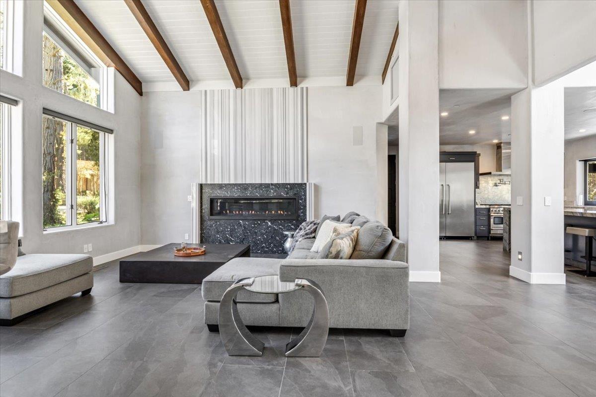 1276 Viscaino Road Pebble Beach, CA 93953 - Photo 47 of 64 a living room with furniture and a fireplace