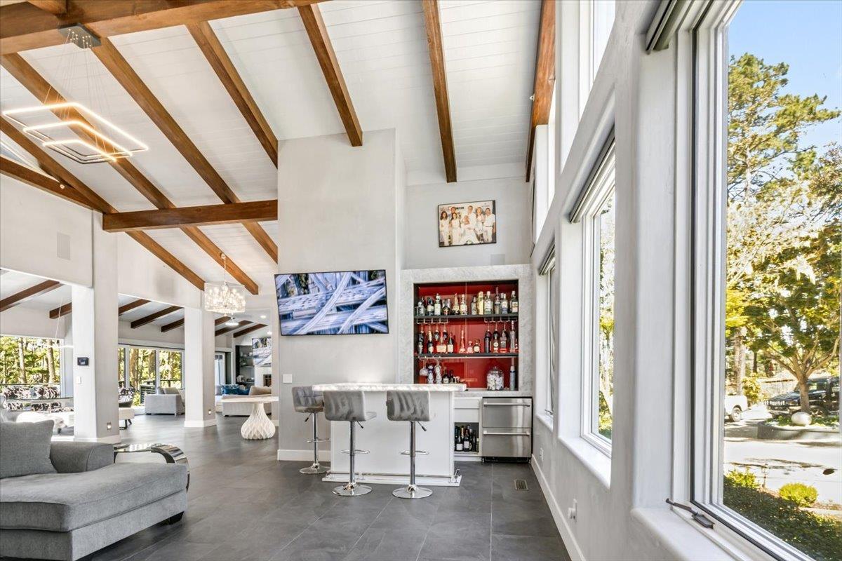 1276 Viscaino Road Pebble Beach, CA 93953 - Photo 10 of 64 a living room with furniture and a window