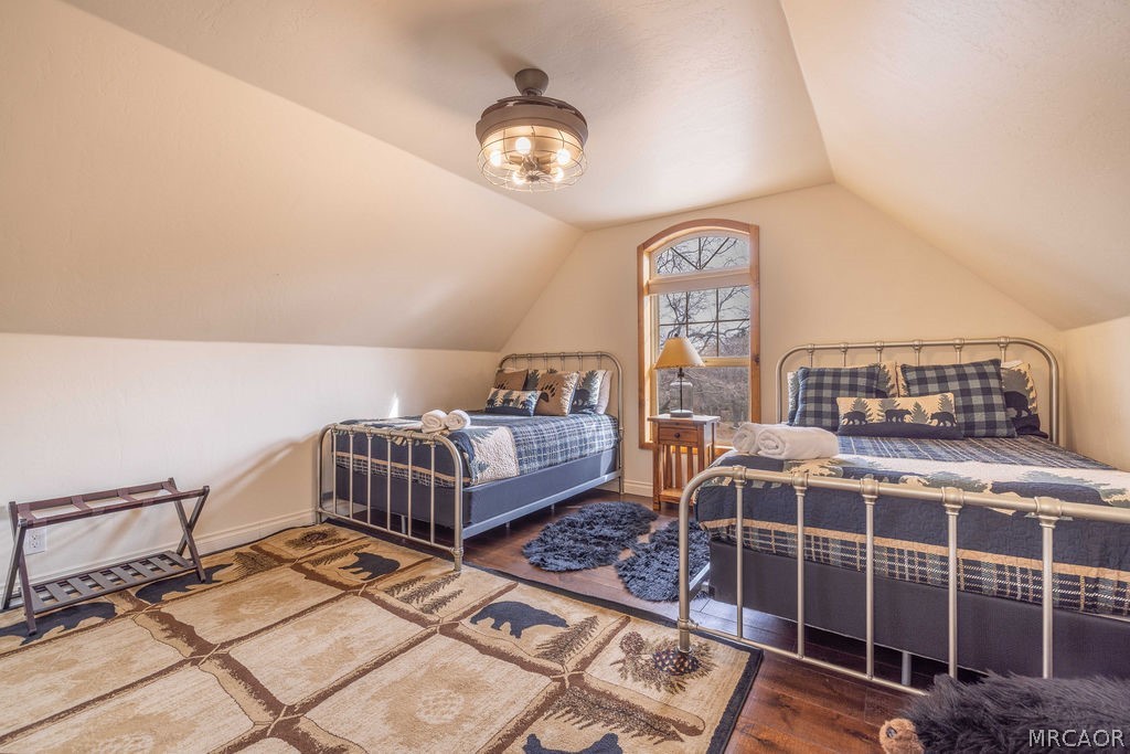 1629 Angels Camp Road Big Bear City, CA 92314 - Photo 24 of 40 a bedroom with furniture and a window
