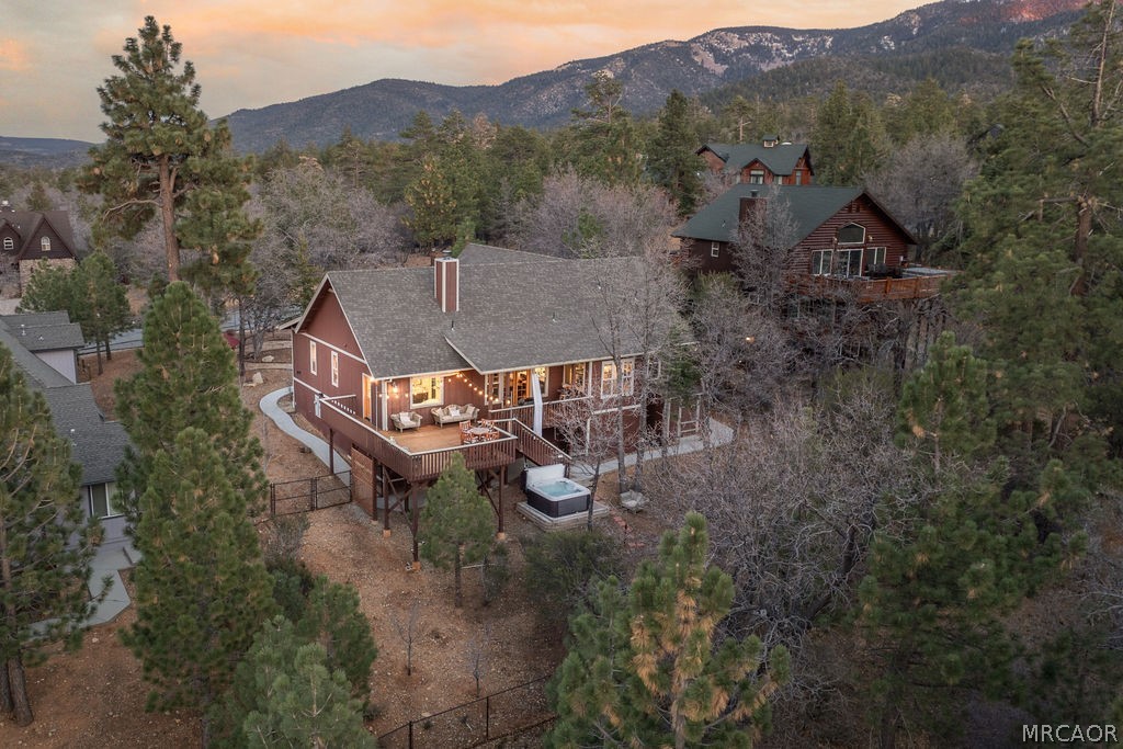 1629 Angels Camp Road Big Bear City, CA 92314 - Photo 39 of 40 an aerial view of a house with a field