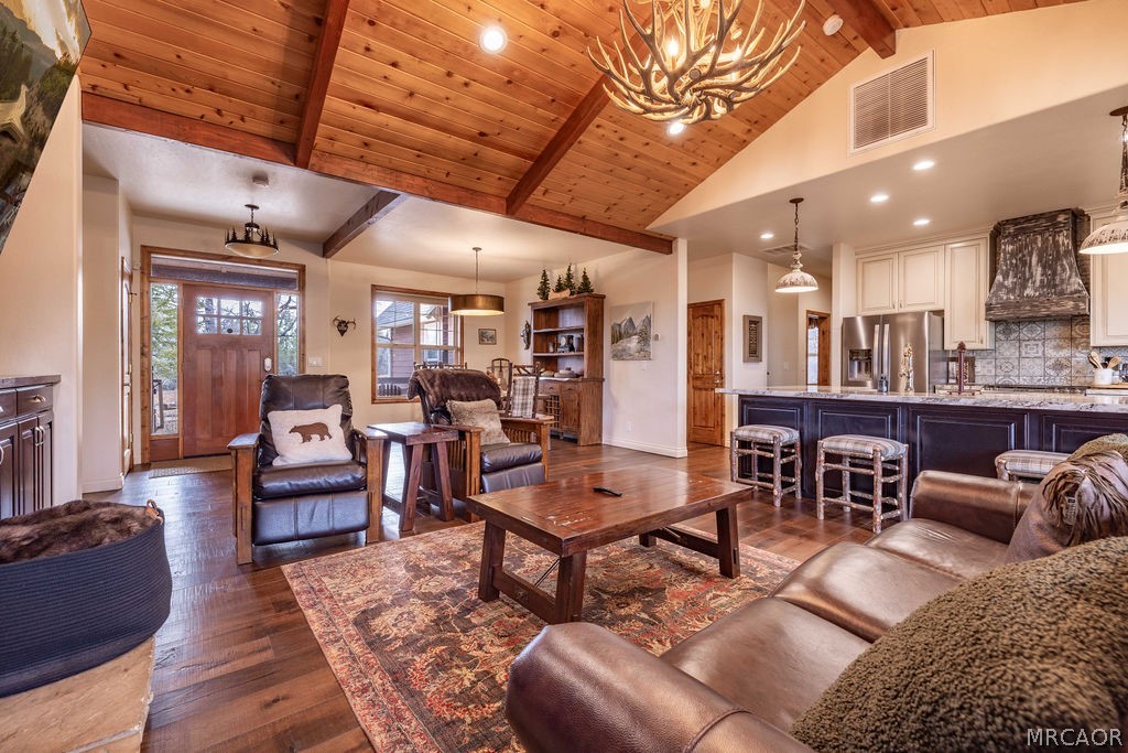 1629 Angels Camp Road Big Bear City, CA 92314 - Photo 9 of 40 a living room with furniture and a view of kitchen