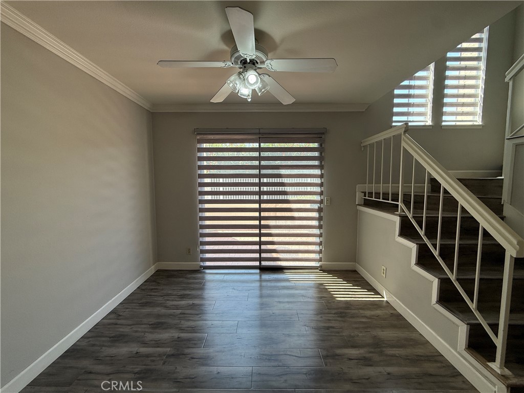 2201 Cheyenne Way, Unit 125 Fullerton, CA 92833 - Photo 16 of 30 a view of empty room with wooden floor and fan