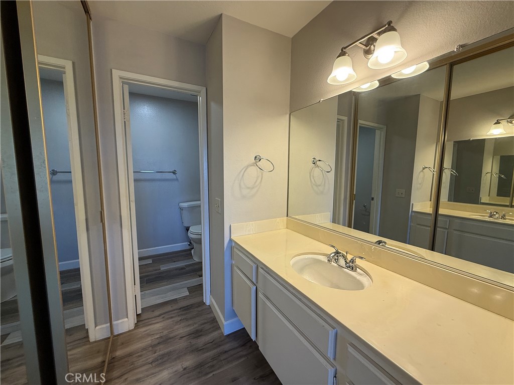 2201 Cheyenne Way, Unit 125 Fullerton, CA 92833 - Photo 24 of 30 a bathroom with a sink double vanity granite tub and shower