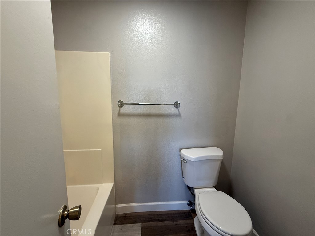 2201 Cheyenne Way, Unit 125 Fullerton, CA 92833 - Photo 25 of 30 a bathroom with a toilet and a shower