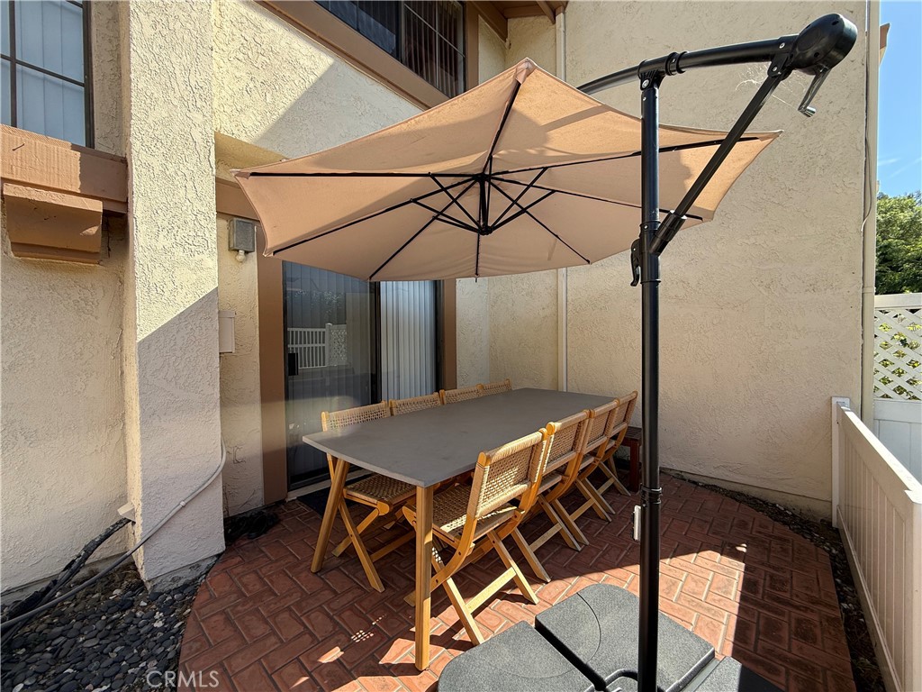 2201 Cheyenne Way, Unit 125 Fullerton, CA 92833 - Photo 27 of 30 a table and chairs in a room