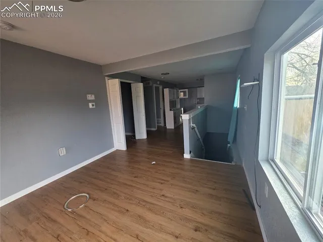 a view of a livingroom with a staircase