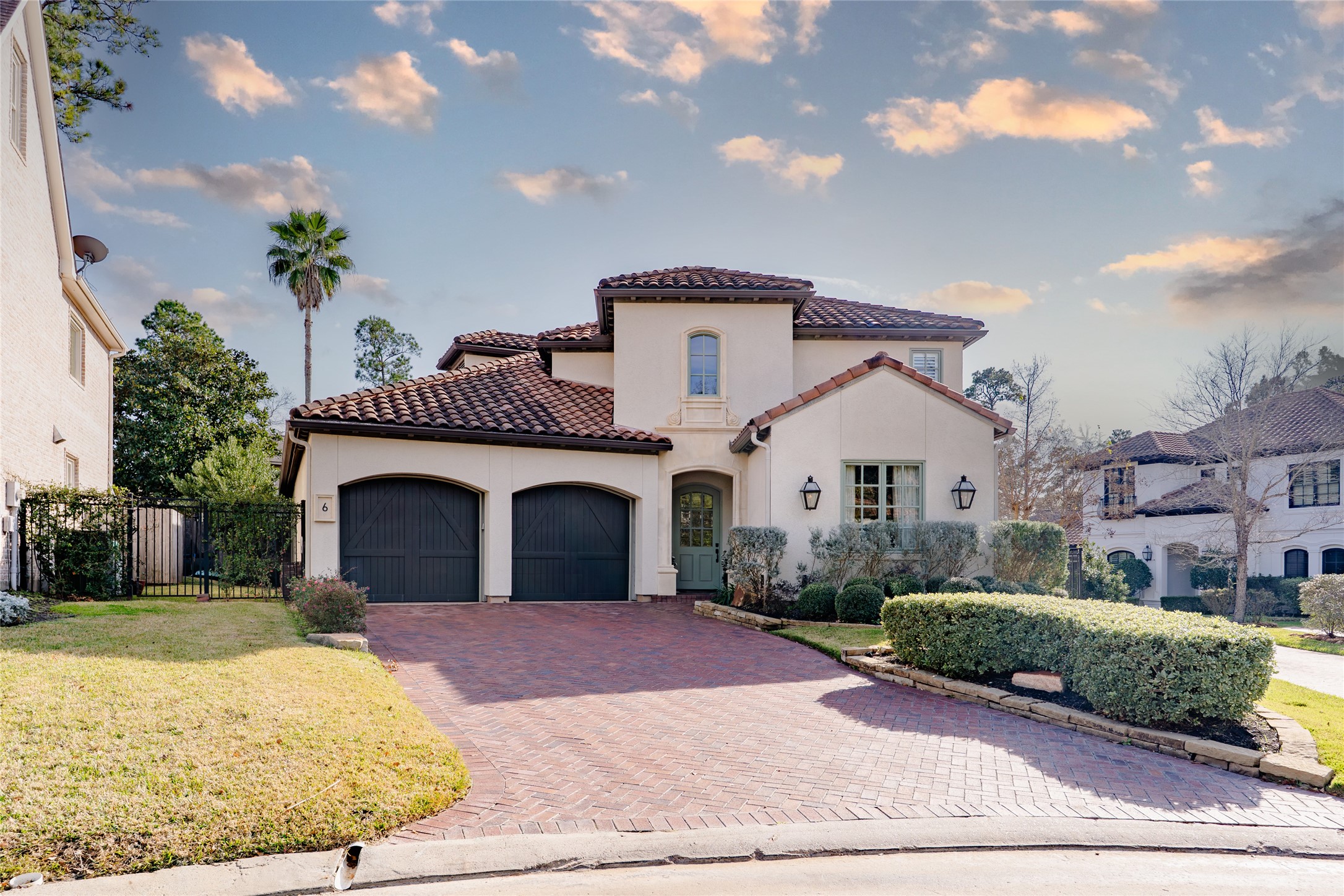 6 Rhapsody Bend Drive The Woodlands, TX 77382 - Photo 1 of 39 a front view of a house with a yard and garage