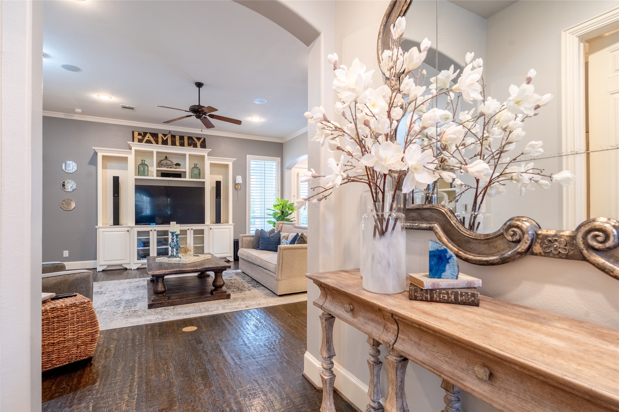 6 Rhapsody Bend Drive The Woodlands, TX 77382 - Photo 16 of 39 a living room with furniture and a flat screen tv