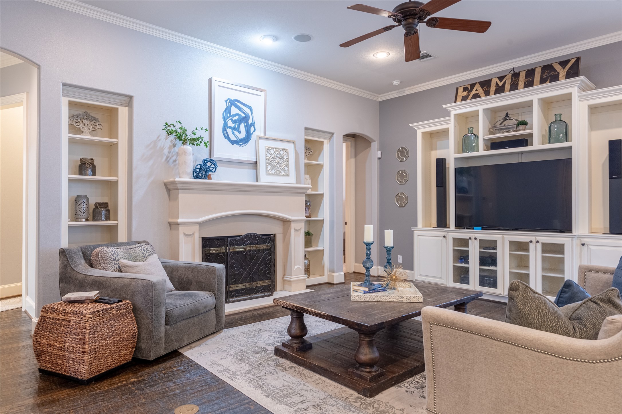 6 Rhapsody Bend Drive The Woodlands, TX 77382 - Photo 17 of 39 a living room with furniture fireplace and flat screen tv