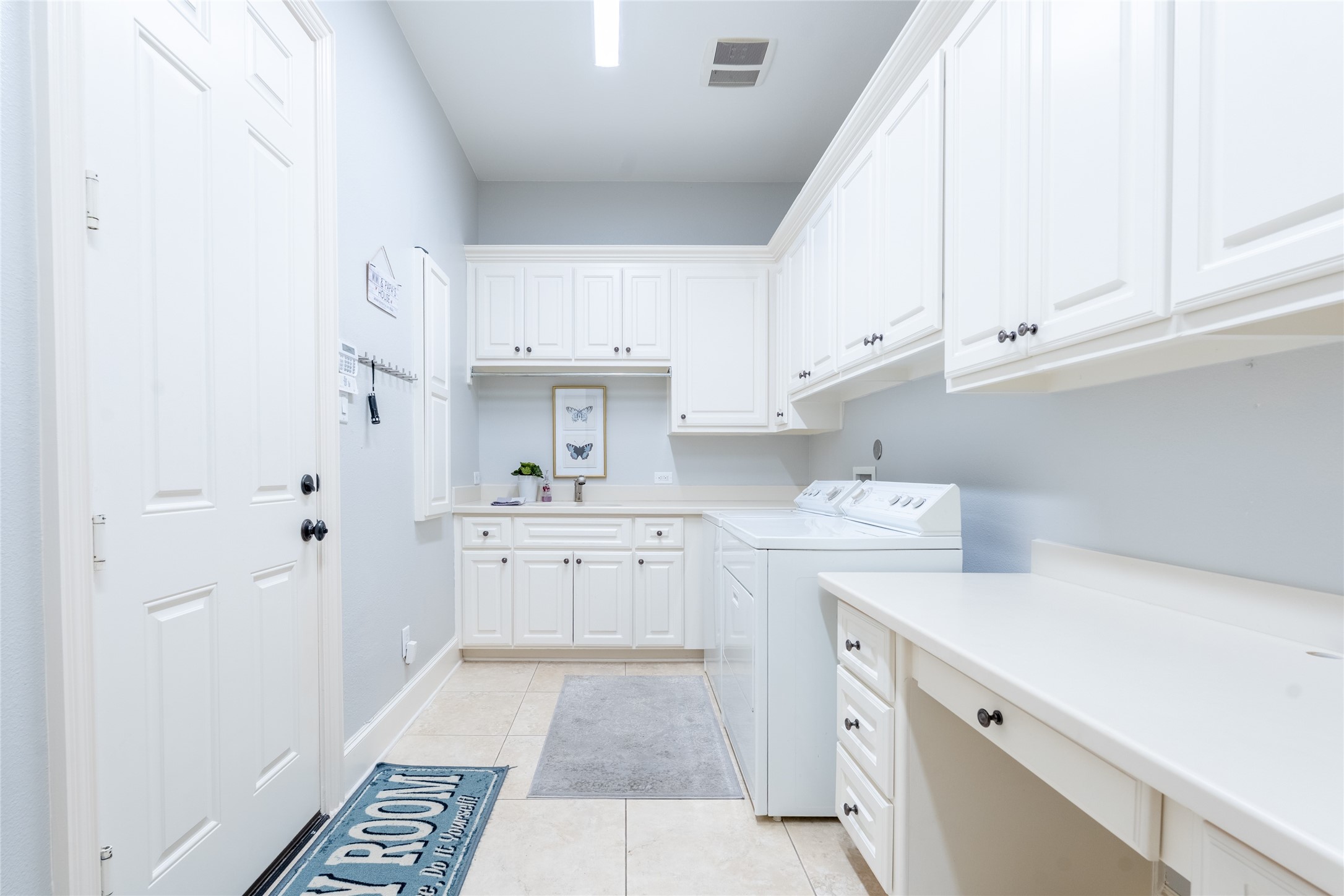 6 Rhapsody Bend Drive The Woodlands, TX 77382 - Photo 30 of 39 a kitchen with cabinets appliances and a window