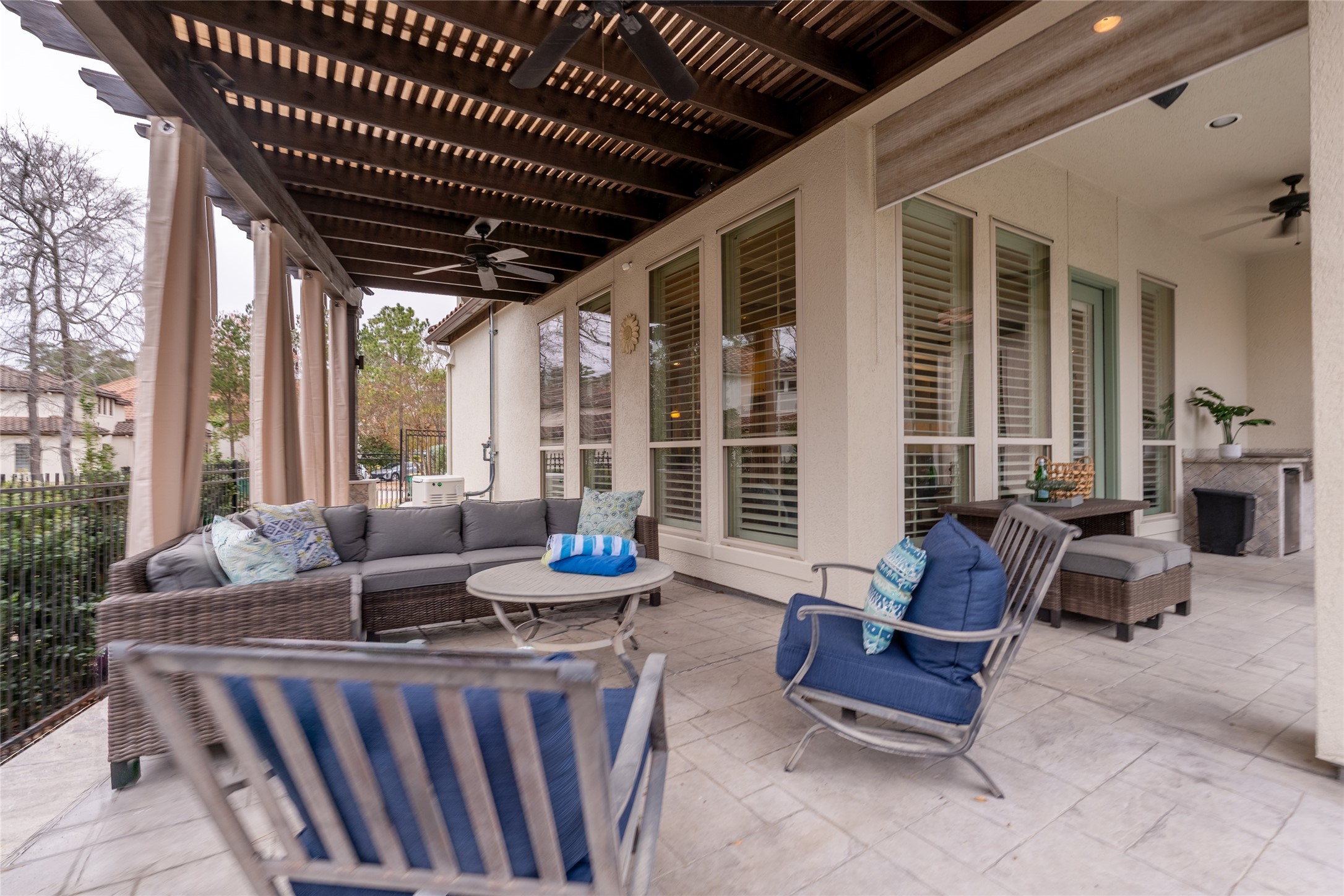6 Rhapsody Bend Drive The Woodlands, TX 77382 - Photo 32 of 39 a outdoor living space with furniture