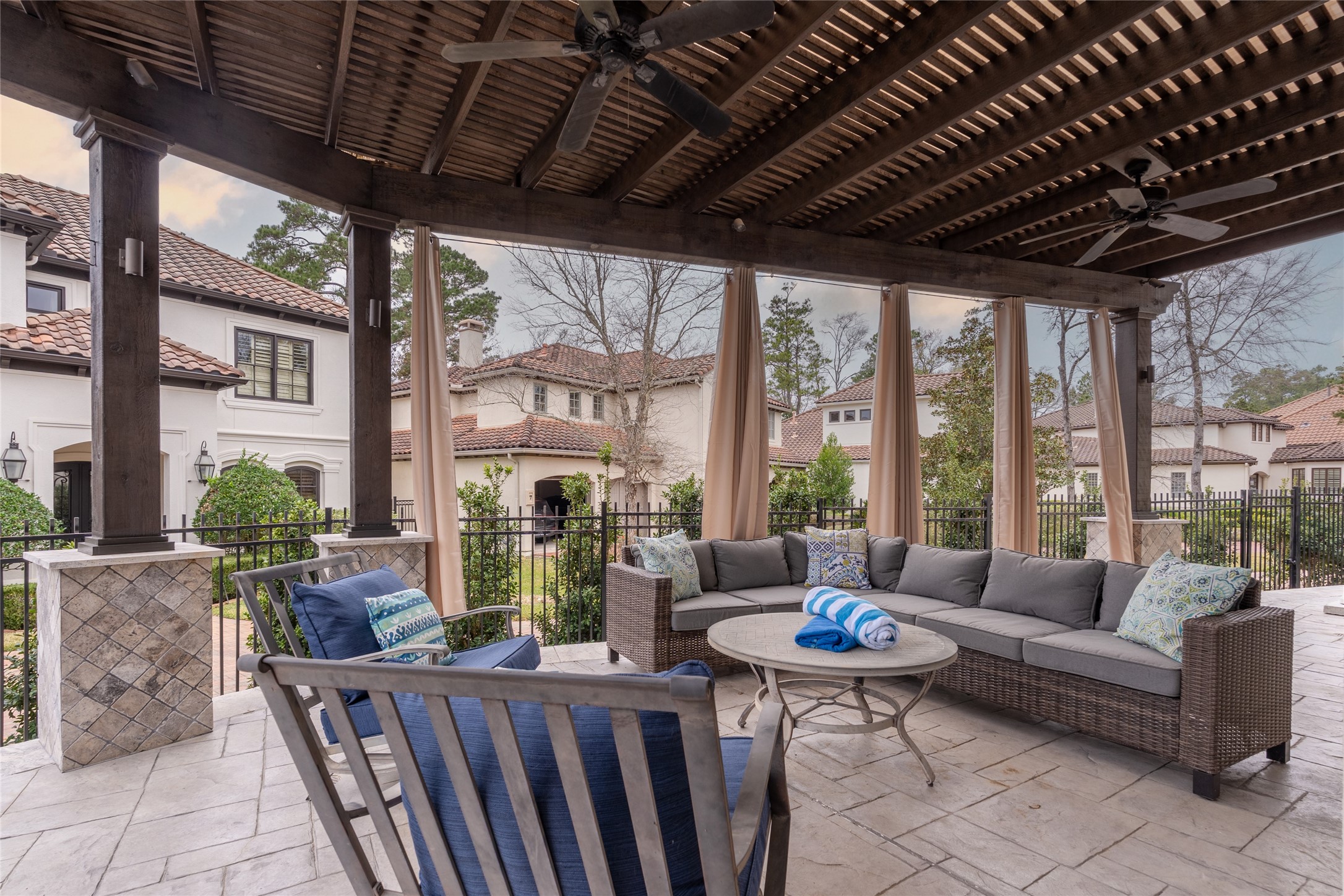 6 Rhapsody Bend Drive The Woodlands, TX 77382 - Photo 33 of 39 a living room with furniture large windows and wooden floor