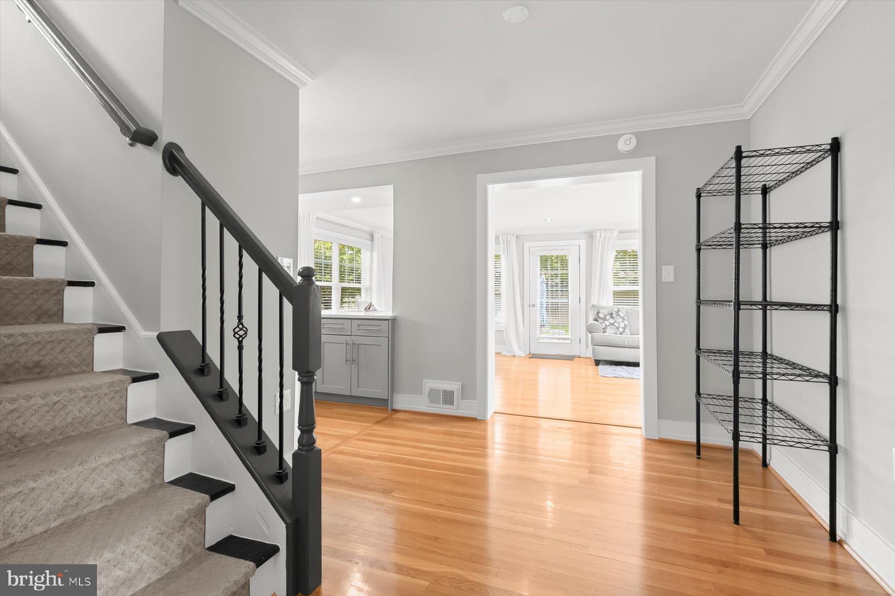 513 Gilmoure Drive Silver Spring, MD 20901 - Photo 12 of 60 a view of an entryway with wooden floor and door