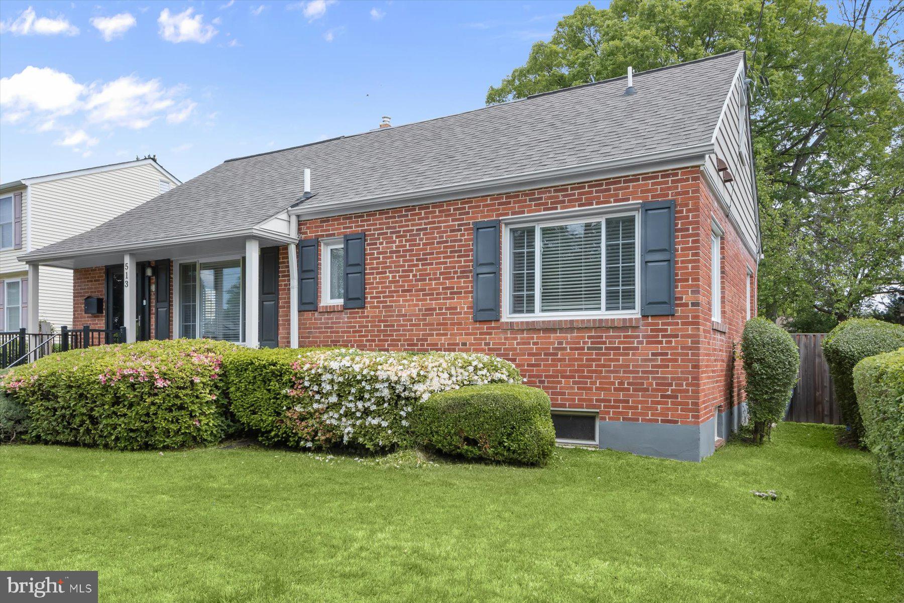 513 Gilmoure Drive Silver Spring, MD 20901 - Photo 3 of 60 a view of a house with a yard