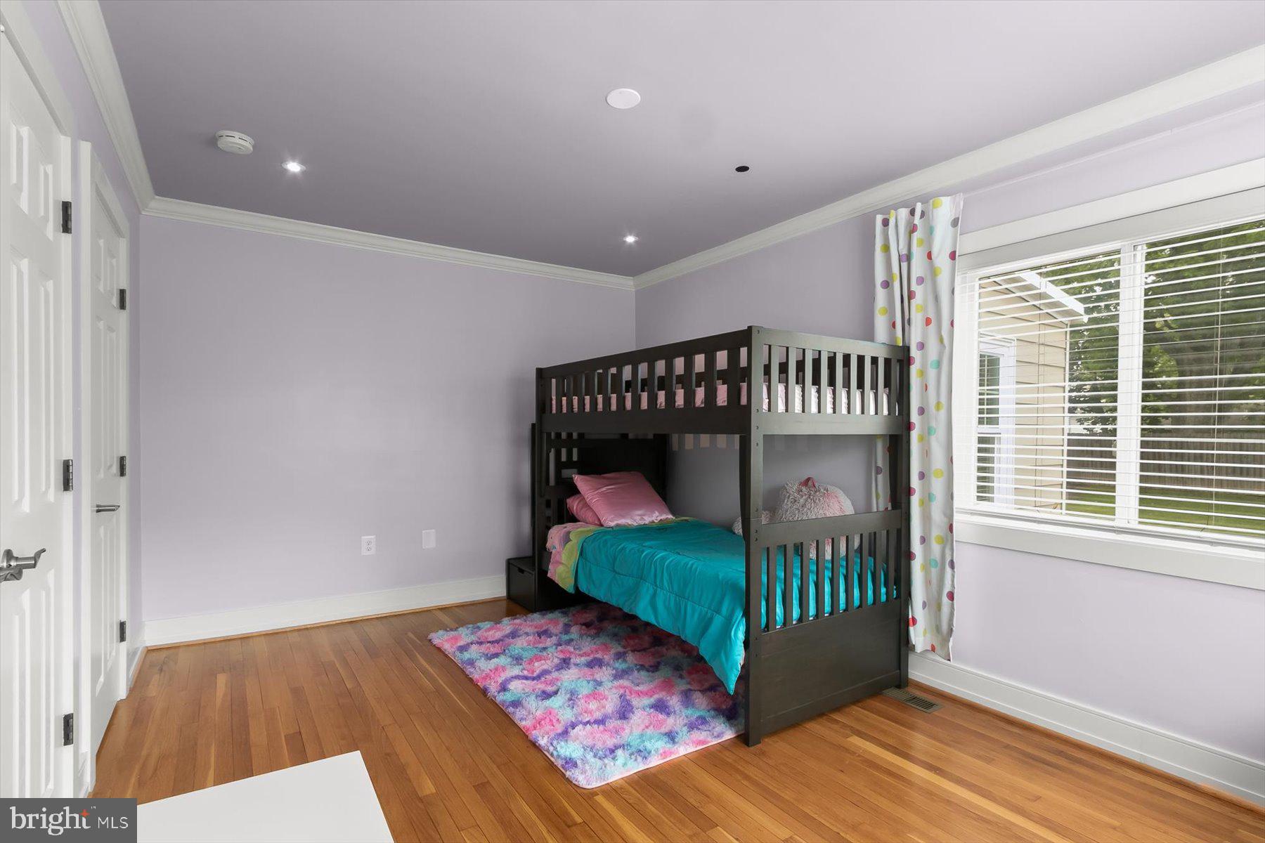 513 Gilmoure Drive Silver Spring, MD 20901 - Photo 31 of 60 a bedroom with a bed and a window
