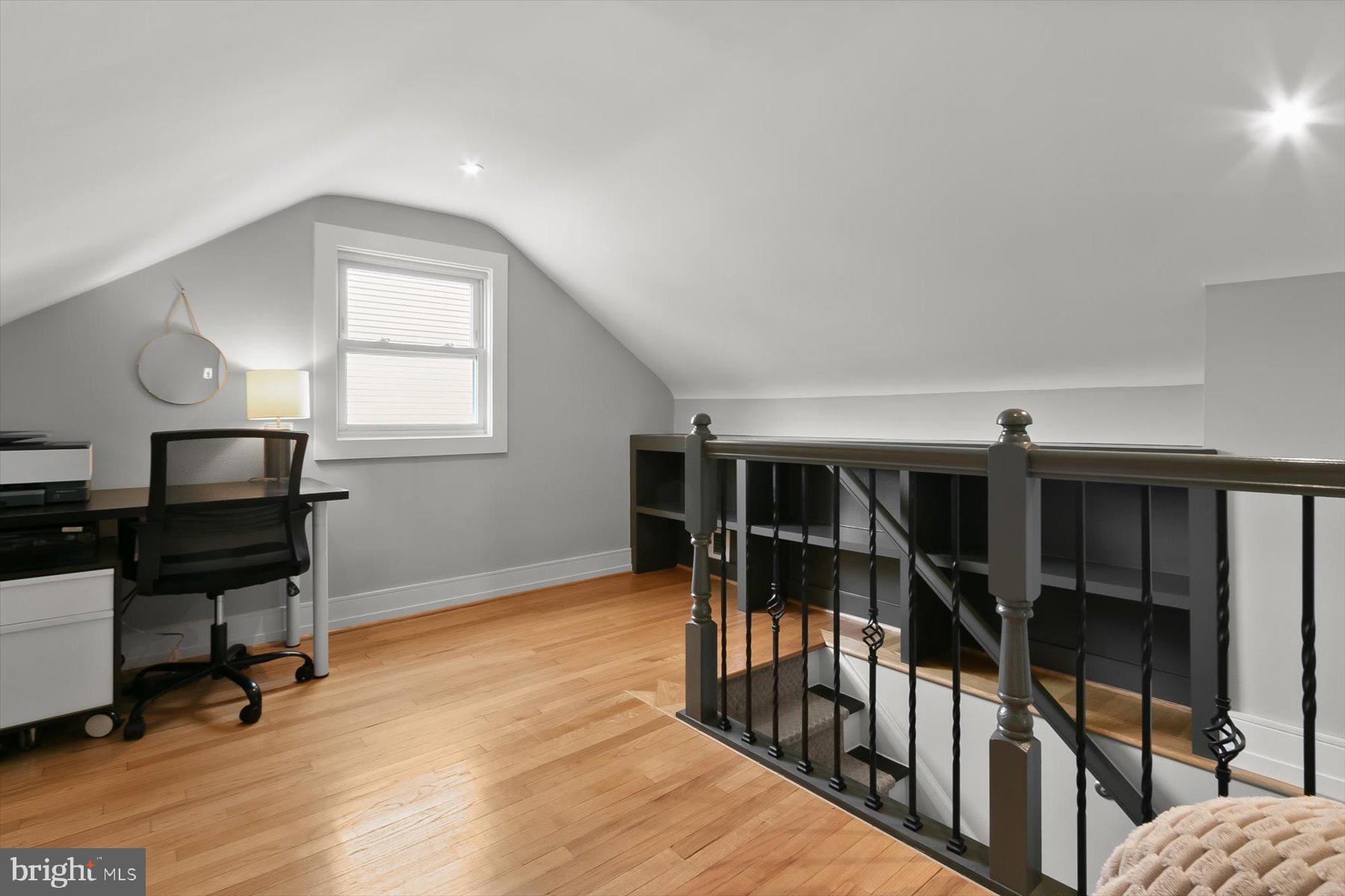 513 Gilmoure Drive Silver Spring, MD 20901 - Photo 32 of 60 a view of a workspace with furniture and a window
