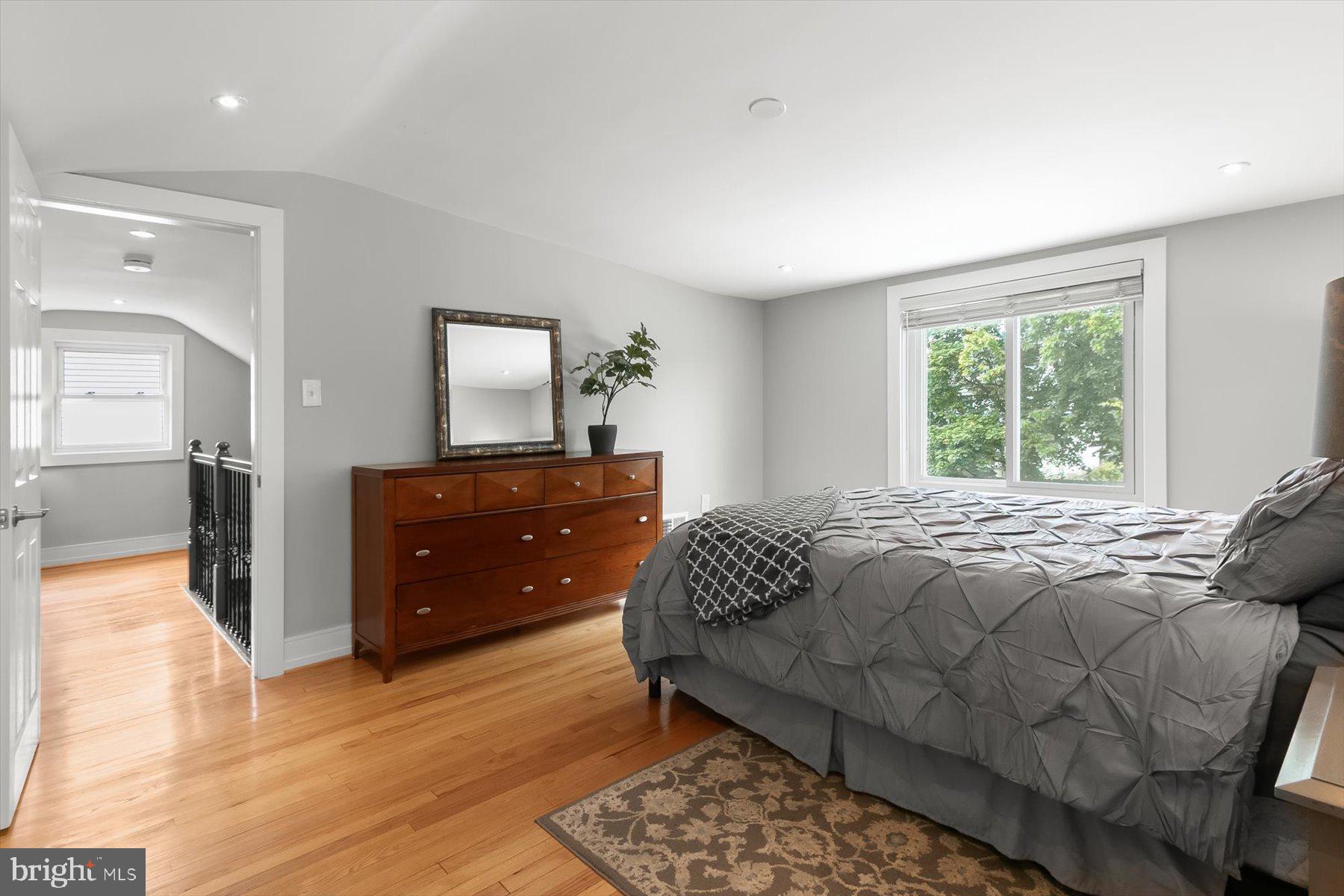 513 Gilmoure Drive Silver Spring, MD 20901 - Photo 36 of 60 a bedroom with a bed and a dresser