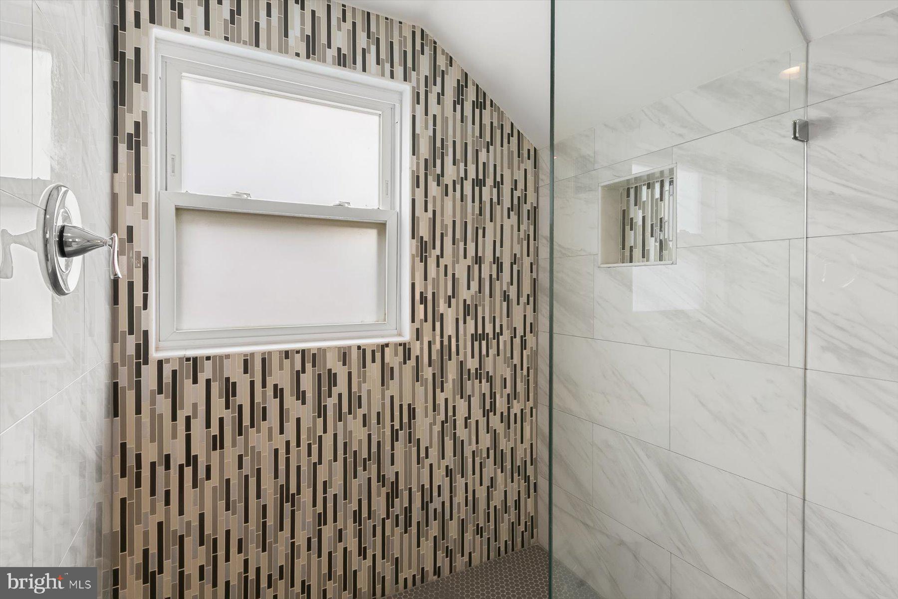 513 Gilmoure Drive Silver Spring, MD 20901 - Photo 41 of 60 a bathroom with a shower