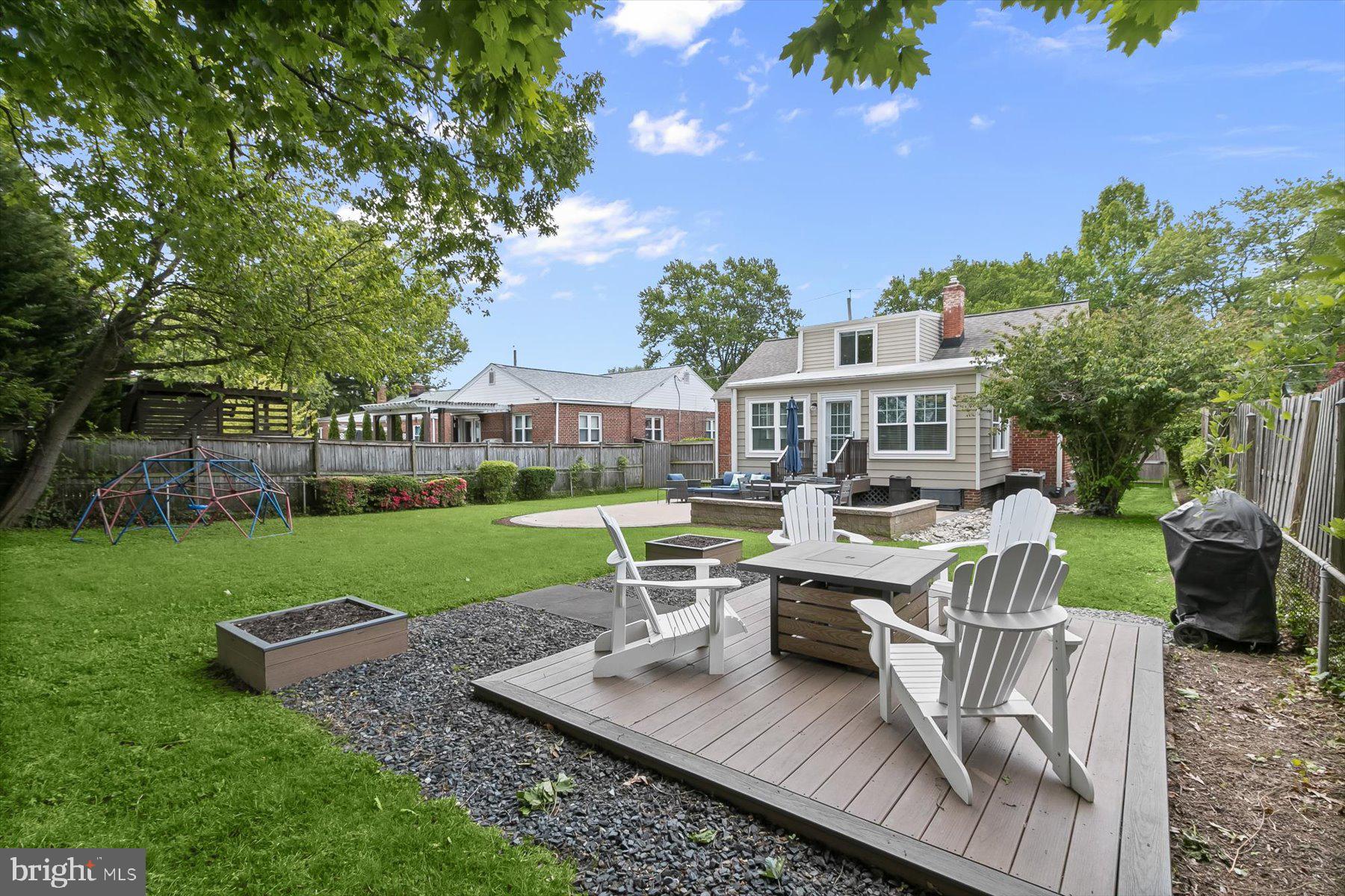 513 Gilmoure Drive Silver Spring, MD 20901 - Photo 60 of 60 a view of a house with backyard sitting area and garden