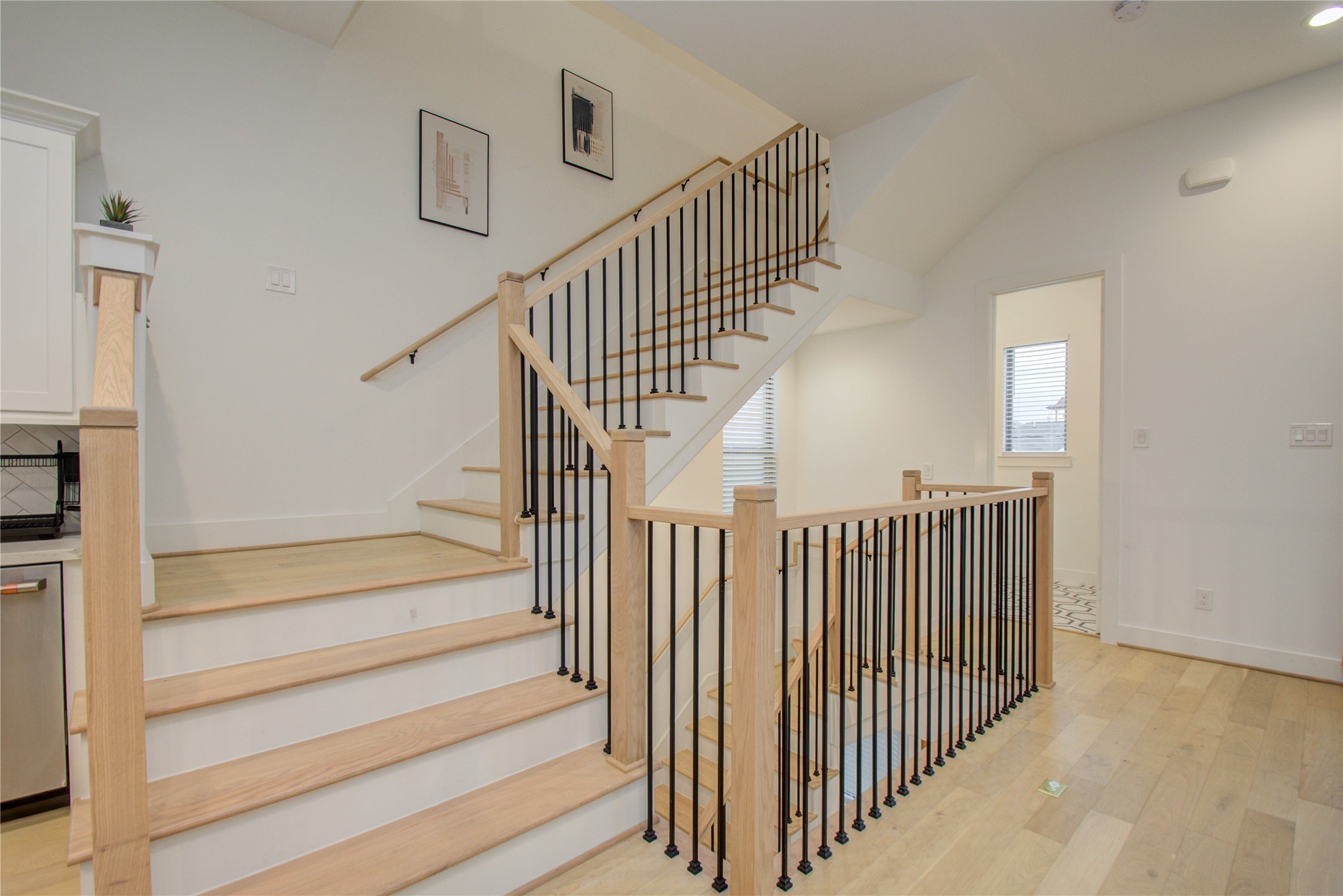 2315 Sherwin Street Houston, TX 77007 - Photo 4 of 50 a view of entryway with wooden floor