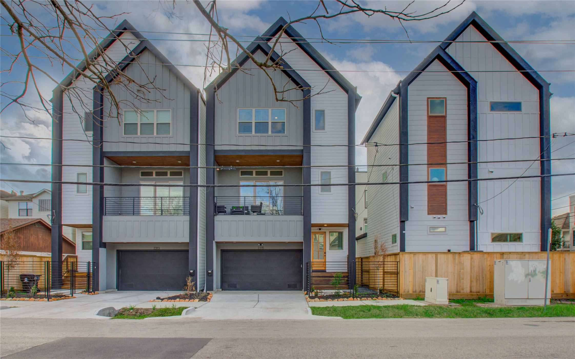 2315 Sherwin Street Houston, TX 77007 - Photo 50 of 50 a view of a large building next to a yard