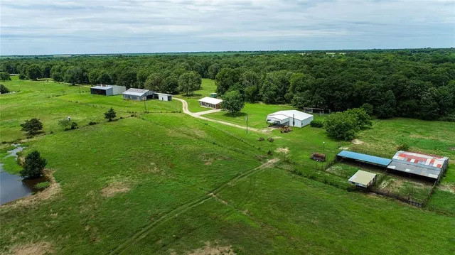 a view of a golf course with chairs