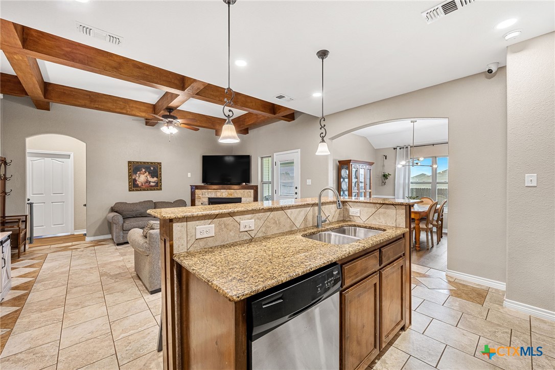 3409 Plains Street Copperas Cove, TX 76522 - Photo 9 of 33 a large kitchen with a table and chairs in it