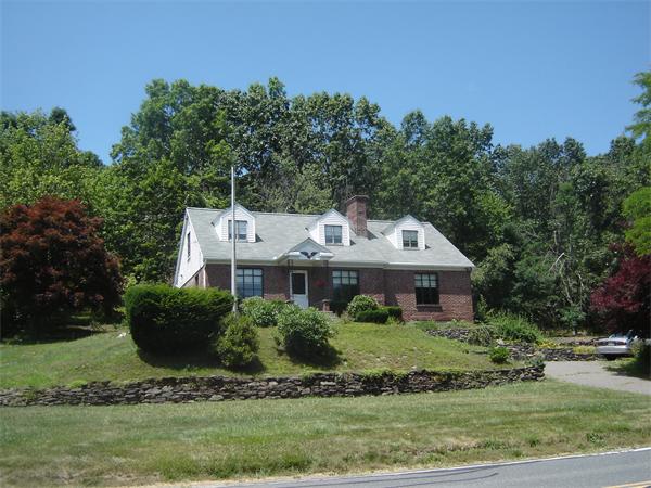 71 Southampton Road Holyoke, MA 01040 - Photo 3 of 12 front view of a house with a yard