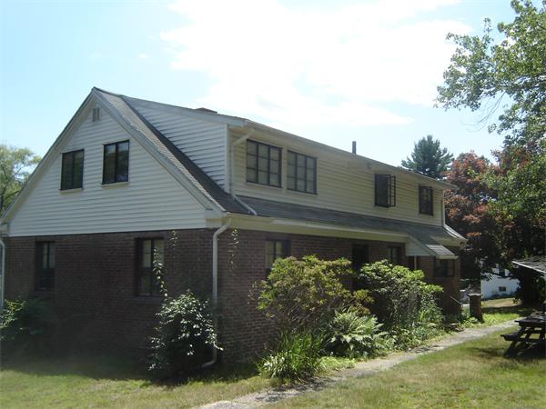 71 Southampton Road Holyoke, MA 01040 - Photo 5 of 12 front view of a house with a yard