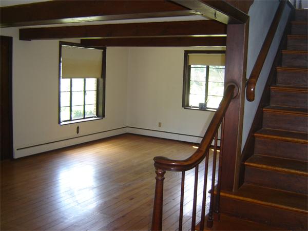 71 Southampton Road Holyoke, MA 01040 - Photo 6 of 12 a view of empty room with wooden floor and fan