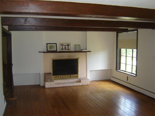71 Southampton Road Holyoke, MA 01040 - Photo 7 of 12 a view of empty room with a fireplace