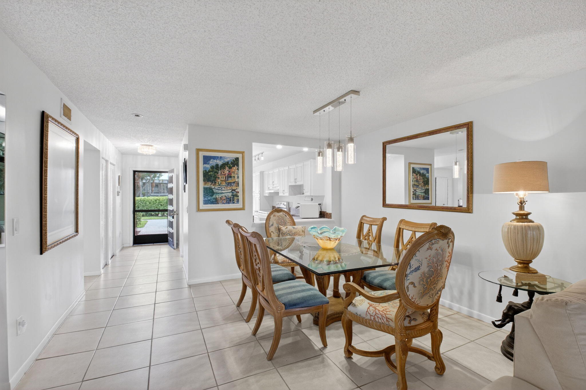 10 Southport Lane, Unit E Boynton Beach, FL 33436 - Photo 10 of 47 a dining room with furniture and window