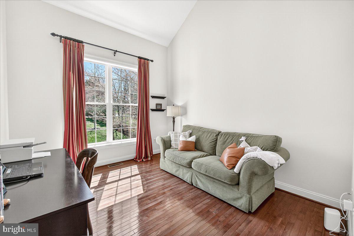 411 William Plummer Street New Market, MD 21774 - Photo 16 of 89 a living room with furniture and a large window
