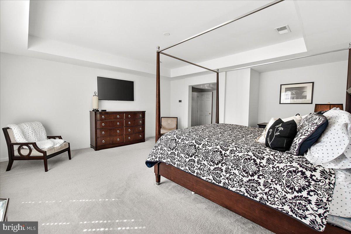 411 William Plummer Street New Market, MD 21774 - Photo 32 of 89 a bedroom with a bed and a couch