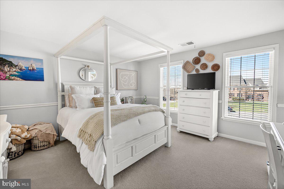 411 William Plummer Street New Market, MD 21774 - Photo 46 of 89 a bed room with a bed and a tv
