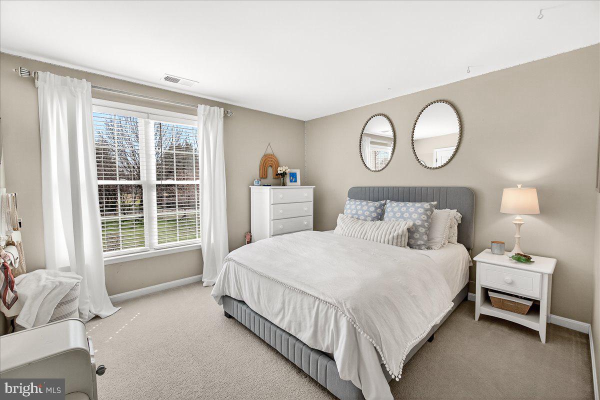 411 William Plummer Street New Market, MD 21774 - Photo 50 of 89 a bedroom with a bed and a window