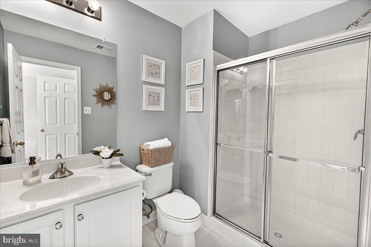 411 William Plummer Street New Market, MD 21774 - Photo 52 of 89 a bathroom with a sink toilet and shower