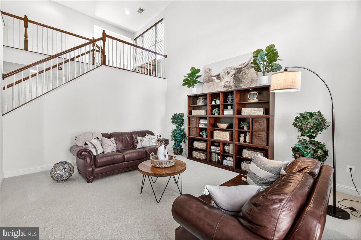 411 William Plummer Street New Market, MD 21774 - Photo 6 of 89 a living room with furniture flowerpot and wooden floor
