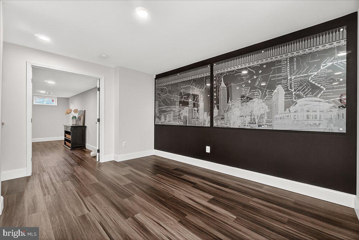 411 William Plummer Street New Market, MD 21774 - Photo 66 of 89 a view of workspace with wooden floor and bedroom view