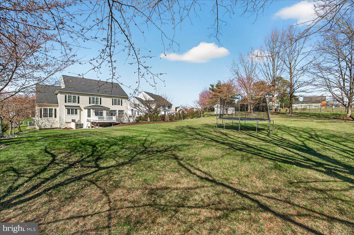 411 William Plummer Street New Market, MD 21774 - Photo 76 of 89 a front view of a house with a yard