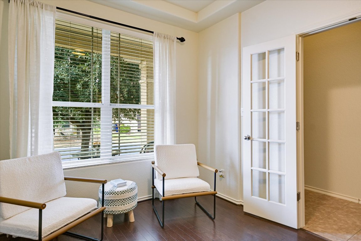 7212 Lookout Bluff Terrace, Unit D18 Austin, TX 78735 - Photo 10 of 22 a living room with furniture and a window